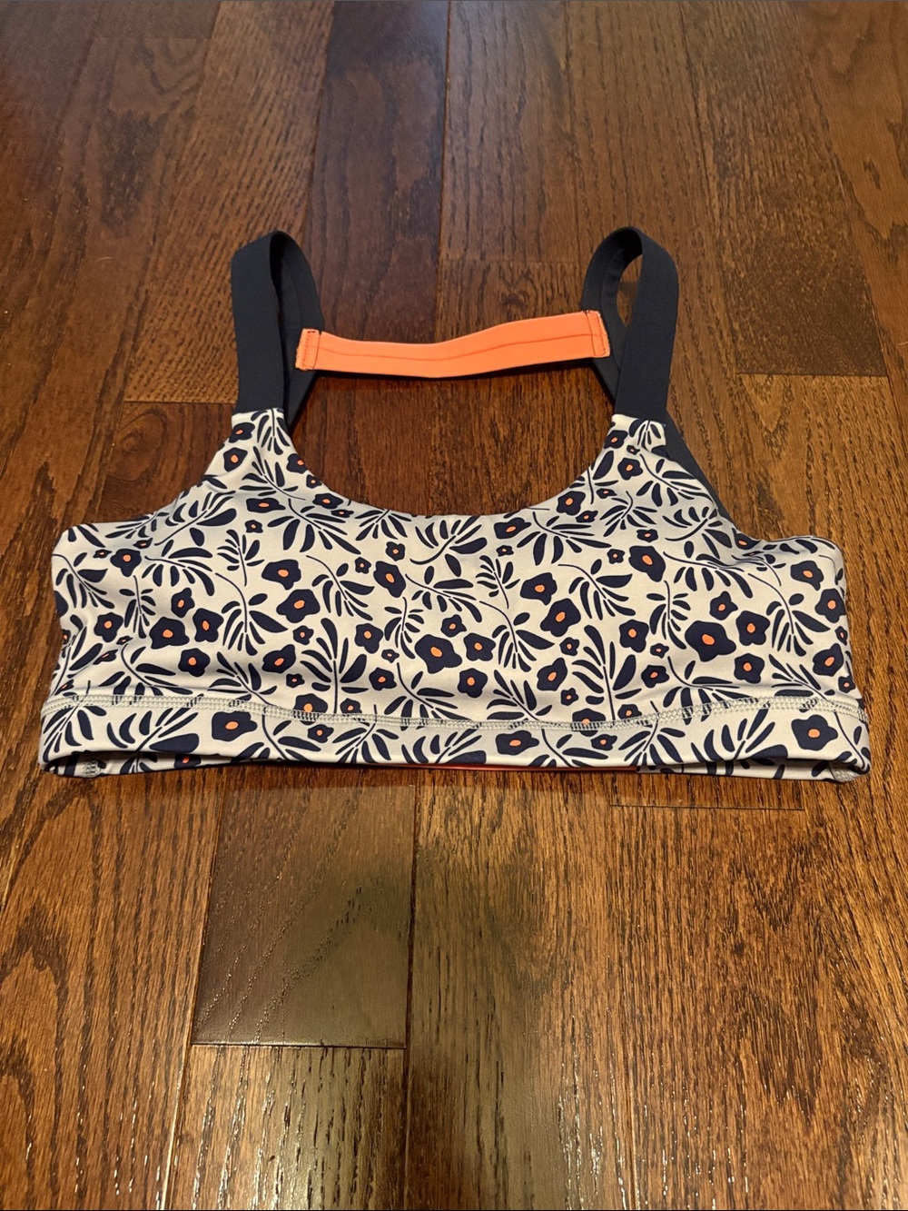 Born Primitive Floral Navy and White Women's sports bra with Orange Accent